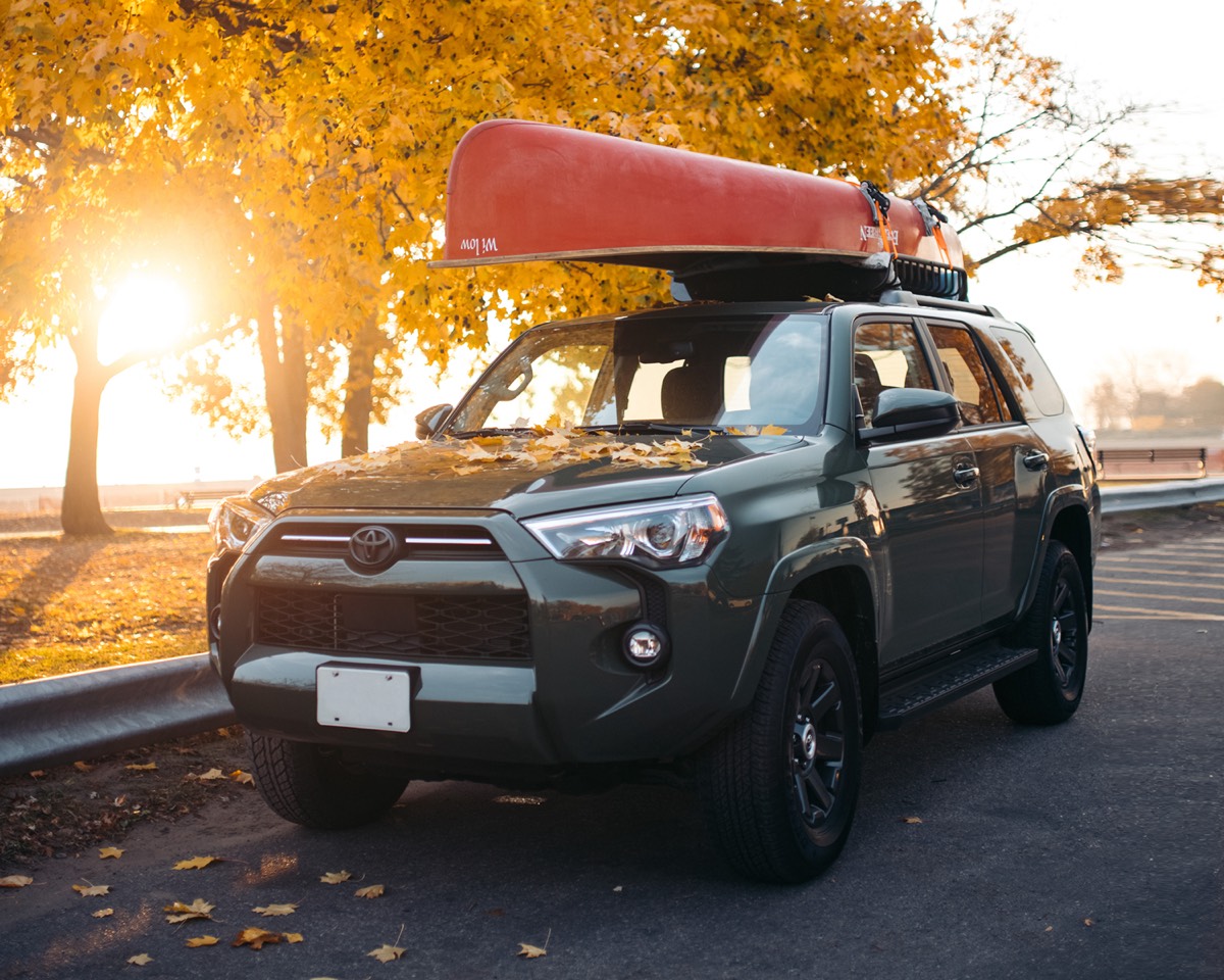 three quarter front view of the 2022 Toyota 4Runner with a canoe hitched on the roof