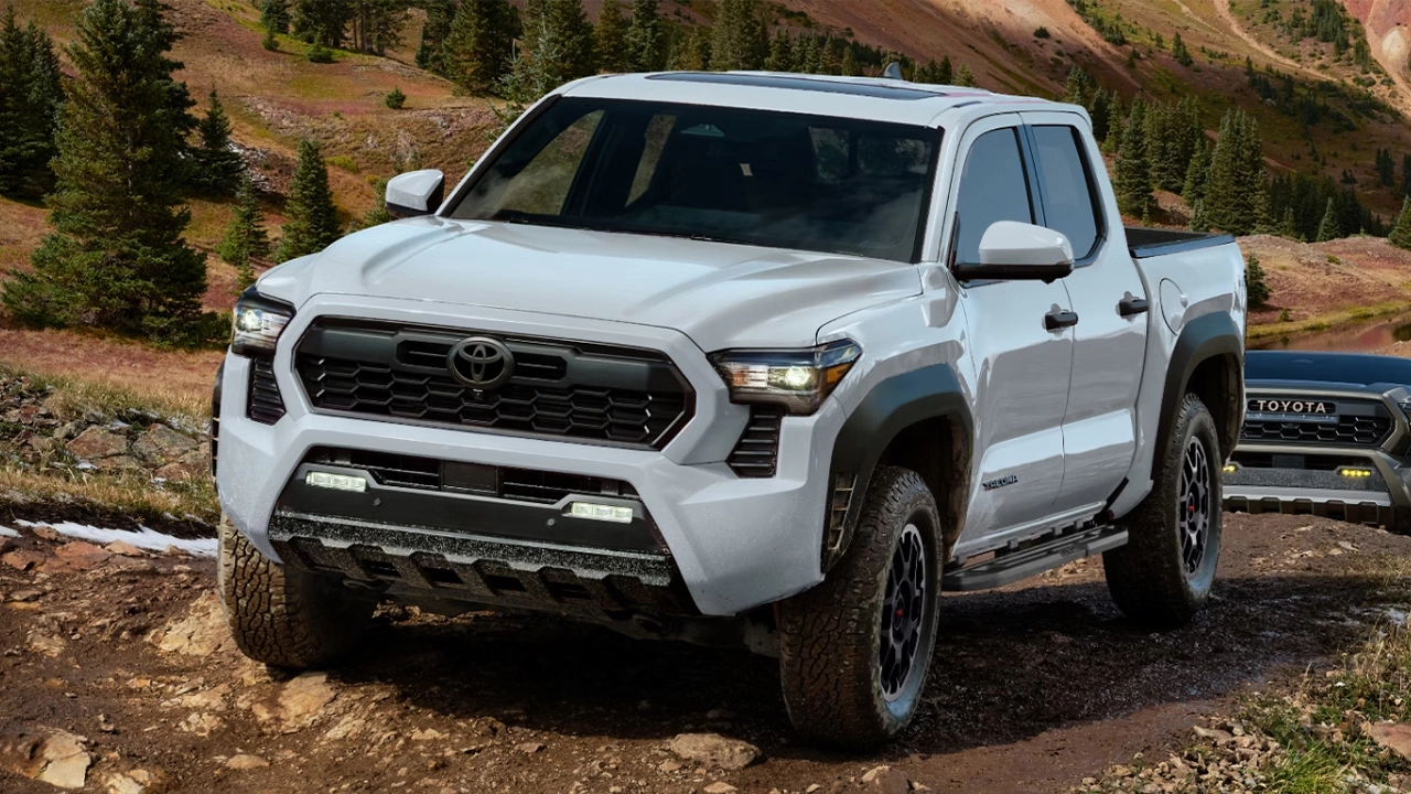 2026 Toyota Tacoma in white on a mountainous off-road trail